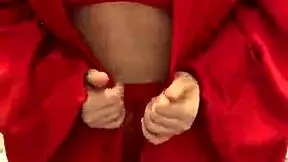 brunette girl in red lingerie masturbates in a reality setting