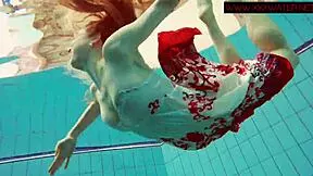 Polish redhead swims in water