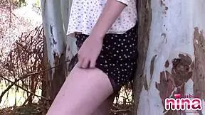 Nina's outdoor tit and pussy show