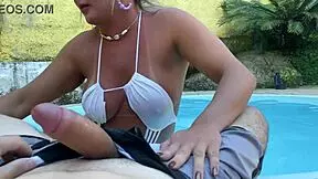 Hey, this sexy brazilian exhibitionist couldn't resist flashing her clit and pussy in the pool for blowjob.