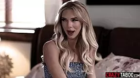 Busty stepmom Tiffany Watson engages in a playful interaction with her lesbian stepdaughter in a family setting.