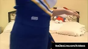 The athletic cheerleader Cleo enjoys a good cheer practice.