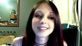 I watch Miss Liz Vicious masturbate with a big pink dildo on cam.