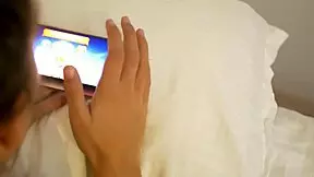 european couple plays game on phone
