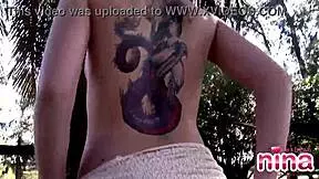 Lesbian Nina shows her body and RUBS her pussy outdoors.