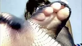 teen explores kinky footjob with toys during a sensual massage.