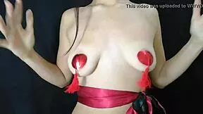 Young girl explores her natural tits with nipple stickers.