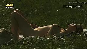Skinny teen self-pleasure in field