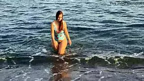 Check out the horny teen with a big ass on the beach getting public action.