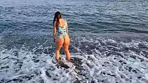 Check out the horny teen with a big ass on the beach getting public action.
