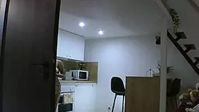 Hey, check out this hot redhead wife flashing in the kitchen