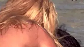 skinny blonde enjoys outdoor anal threesome in river with double penetration