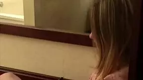 Shy young woman bravely undresses and masturbates in solo striptease