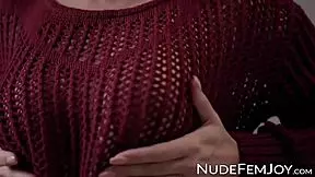 Young beauty teases by revealing her trimmed pussy