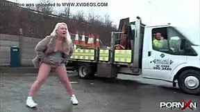 A petite European girl pees in public
