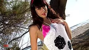 nice teen lucia nieto strips on the beach