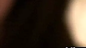 two teen girls chat and play with camera in bedroom