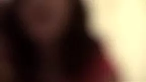 two teen girls chat and play with camera in bedroom