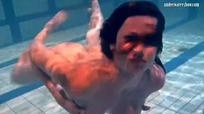 ivetta splashes around in the pool, drawing every eye with her underwater moves.