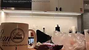 Why does the young wife flash her tight pussy while doing dishes?