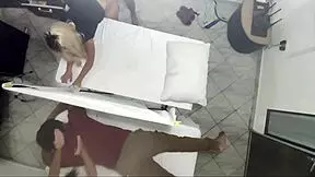 Real footage shows a masseur banging a woman right next to her clueless husband.