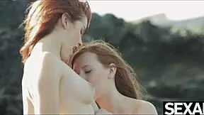 Redheads get it on beach