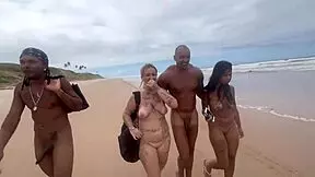 Brunette teen nerd goes wild at nudist beach