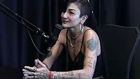 She dominates in gang bang with eight big cocks