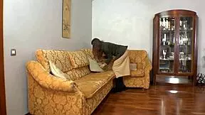 Busty redhead reveals her bush to the camera