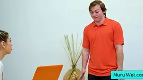 Sexy teen 18+ masseuse Delilah Day rubs naked body with nuru gel on Anthony Pierce.