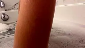 petite brunette girl moans loud while showering her tight body