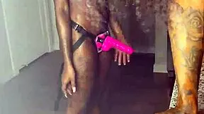 Ebony women enjoy strap-on activities with Renity Love and Majesty Nasty.
