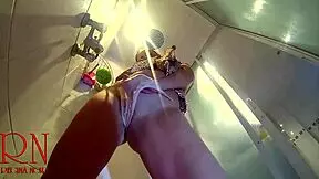 hidden camera catches a young naked girl stripping down in the shower room for a steamy view