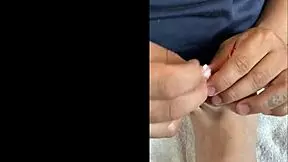 latina girl talks to followers while showing barefoot feet and toes