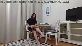 Evelyn trying on black and tan pantyhose solo girl tease