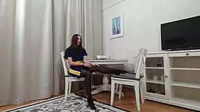 Evelyn teases in black and tan pantyhose, looking so sexy