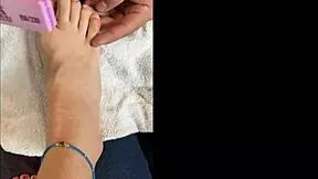 latina girl talks to followers while showing barefoot feet and toes