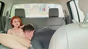 Redhead teen kissed and flashed in car with milf.