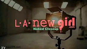 alluring brunette beauty reveals her sexy body on the sofa