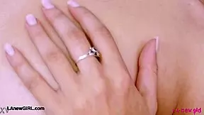 alluring brunette beauty reveals her sexy body on the sofa