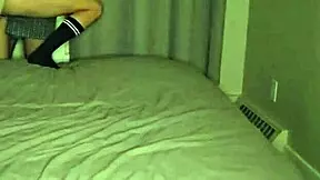 young silly brunette girl plays around in the bedroom