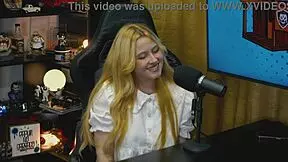 why does this blonde teen bend over the podcast table, showing her wet pussy?