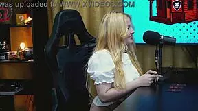 why does this blonde teen bend over the podcast table, showing her wet pussy?