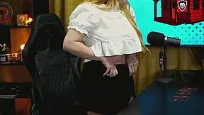 why does this blonde teen bend over the podcast table, showing her wet pussy?