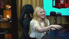 why does this blonde teen bend over the podcast table, showing her wet pussy?