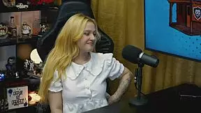 why does this blonde teen bend over the podcast table, showing her wet pussy?