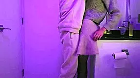 Naughty woman in restaurant restroom