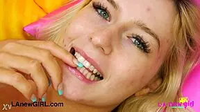 dashing blonde model caresses her body during photoshoot