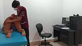 Doctor examines tall teen with long hair in clinic