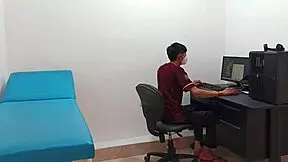 Doctor examines tall teen with long hair in clinic